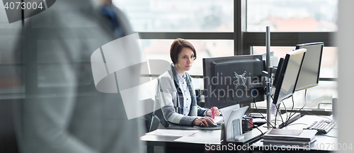 Image of Personal assistant working in corporate office.