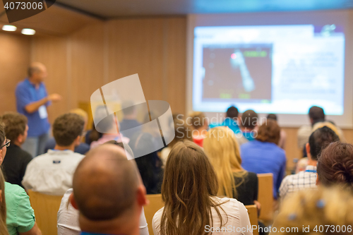 Image of Audience in lecture hall on scientific conference.