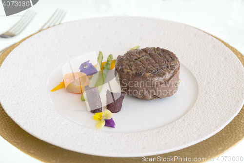 Image of minimalistic dish steak with vegetables