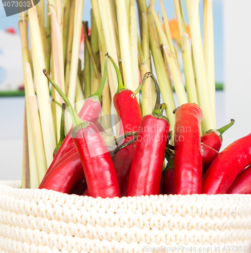 Image of peppers in a wicker basket close-up