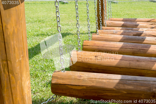 Image of childrens bridge made of logs and chains