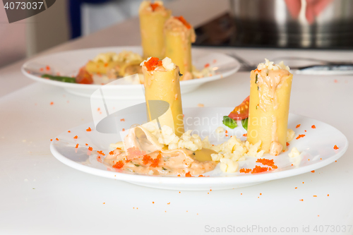 Image of appetizer - cheese rolls with meat and vegetables