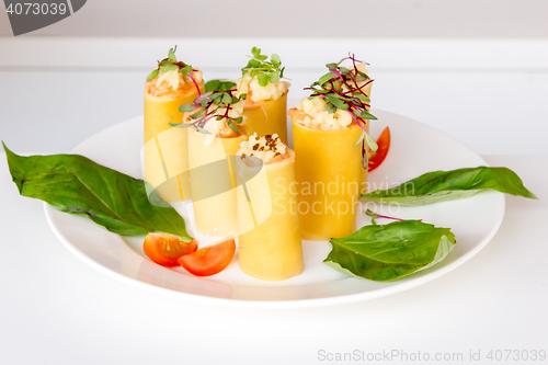 Image of appetizer - cheese rolls with meat and vegetables
