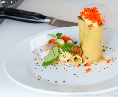 Image of appetizer - cheese rolls with meat and vegetables