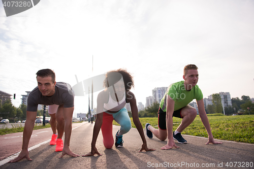 Image of multiethnic group of people on the jogging