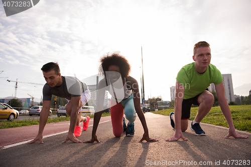 Image of multiethnic group of people on the jogging