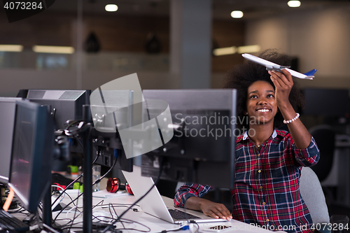 Image of portrait of a young successful African-American woman in modern 