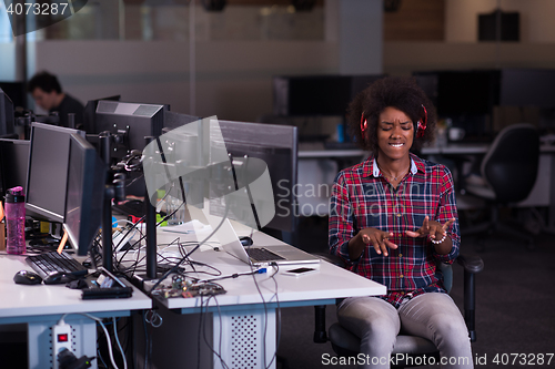 Image of portrait of a young successful African-American woman in modern 