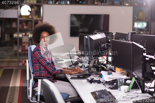 Image of portrait of a young successful African-American woman in modern 