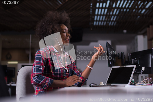 Image of portrait of a young successful African-American woman in modern 