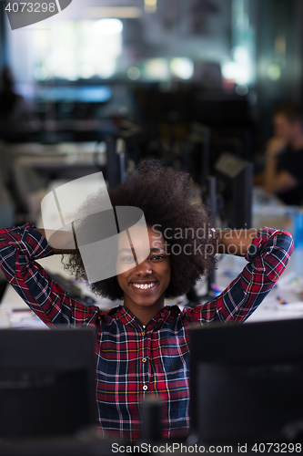 Image of portrait of a young successful African-American woman in modern 