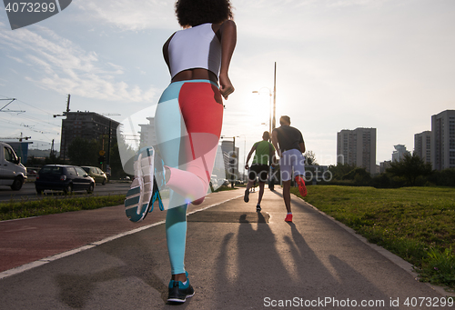 Image of multiethnic group of people on the jogging