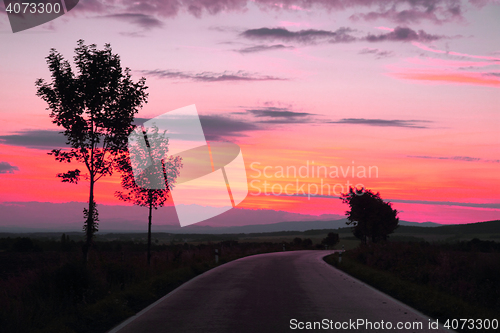 Image of sunset on the road