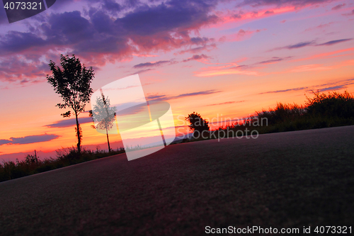 Image of sunset on the road