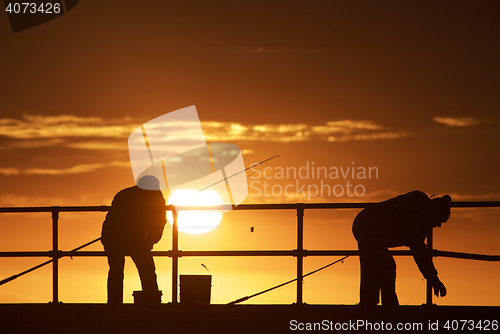 Image of Fishing men at the beach