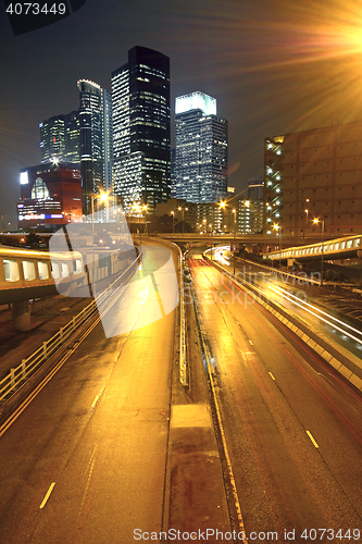 Image of urban landscape at night and through the city traffic 