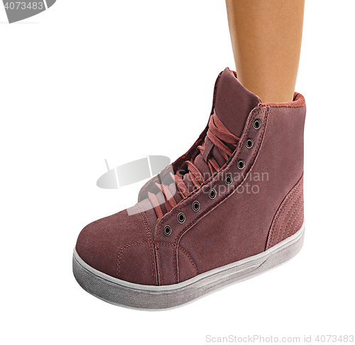 Image of Female leg in a shoe,