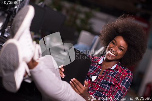 Image of portrait of a young successful African-American woman in modern 