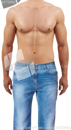 Image of beautiful athletic man in jeans