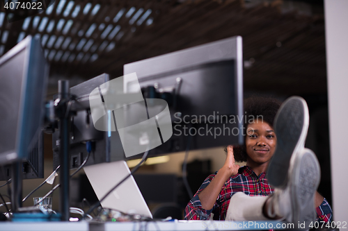 Image of portrait of a young successful African-American woman in modern 