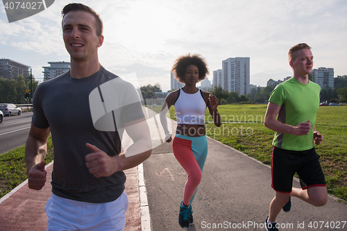 Image of multiethnic group of people on the jogging