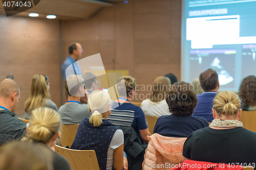 Image of Audience in lecture hall on scientific conference.