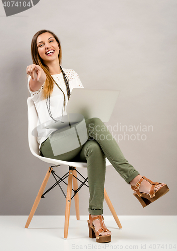 Image of Woman working with a lapptop