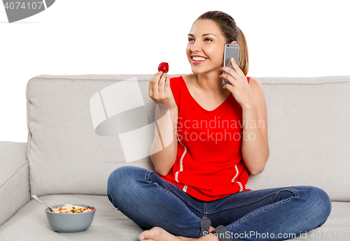 Image of Happy woman at home