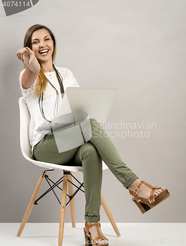 Image of Woman working with a lapptop