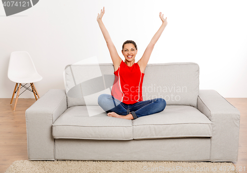 Image of Happy woman at home