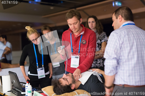 Image of Participants learning new ultrasound techniques on medical congress.