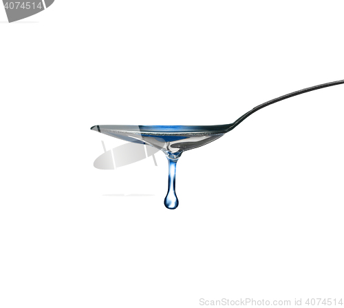 Image of spoon with oil drop