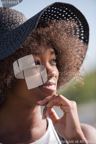 Image of Close up portrait of a beautiful young african american woman sm