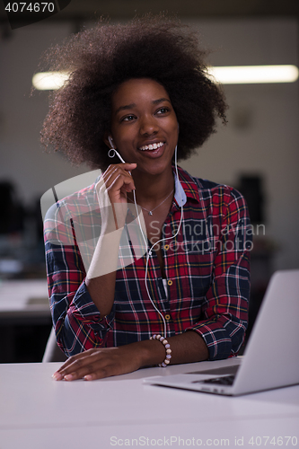 Image of portrait of a young successful African-American woman in modern 