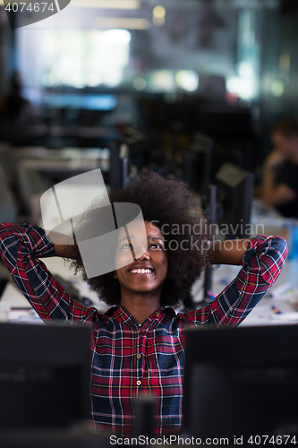 Image of portrait of a young successful African-American woman in modern 