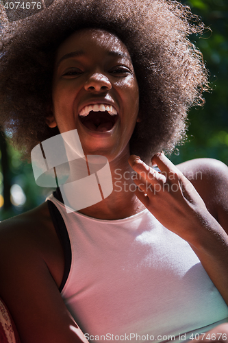 Image of Close up portrait of a beautiful young african american woman sm