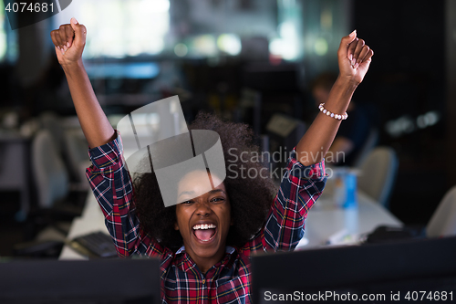 Image of portrait of a young successful African-American woman in modern 