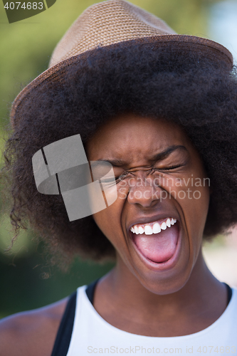 Image of Close up portrait of a beautiful young african american woman sm