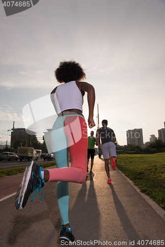 Image of multiethnic group of people on the jogging