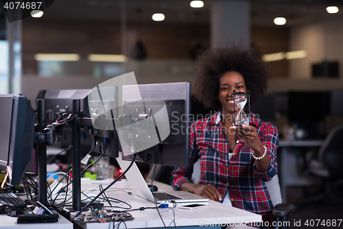 Image of portrait of a young successful African-American woman in modern 