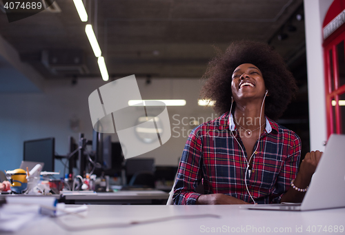 Image of portrait of a young successful African-American woman in modern 