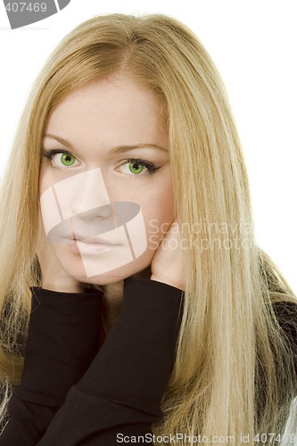 Image of young attractive green-eyed dreaming woman