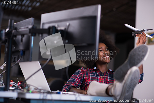 Image of portrait of a young successful African-American woman in modern 
