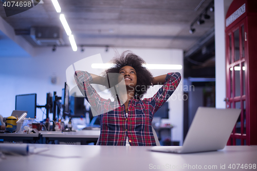 Image of portrait of a young successful African-American woman in modern 