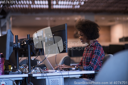 Image of portrait of a young successful African-American woman in modern 