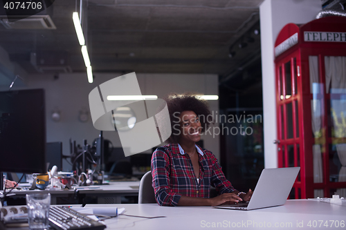 Image of portrait of a young successful African-American woman in modern 