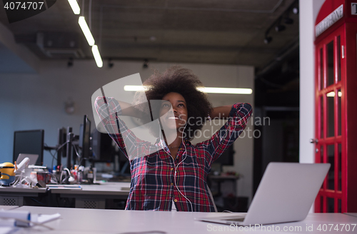 Image of portrait of a young successful African-American woman in modern 