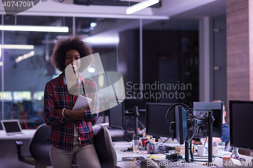 Image of portrait of a young successful African-American woman in modern 