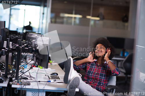 Image of portrait of a young successful African-American woman in modern 