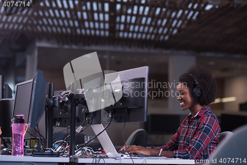 Image of portrait of a young successful African-American woman in modern 